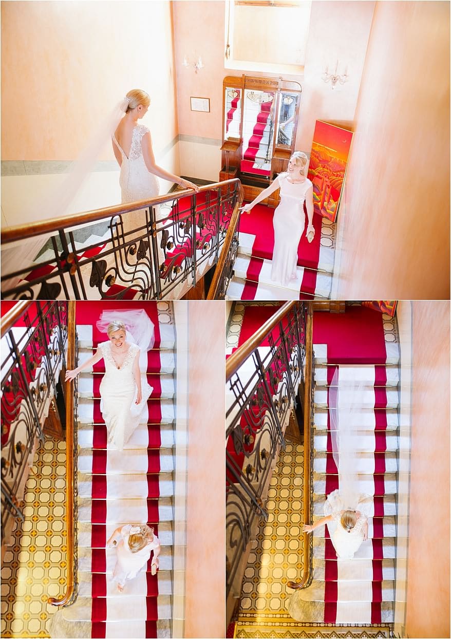 Bride walking down the stairs with her bridemaid at Hotel Laurin italy