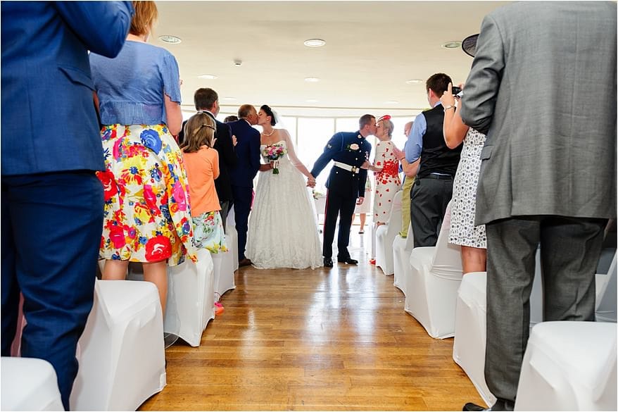 Bride & Groom walking down the aisle at the glendorgal hotel Bride & Groom walking down the aisle at the glendorgal hotel