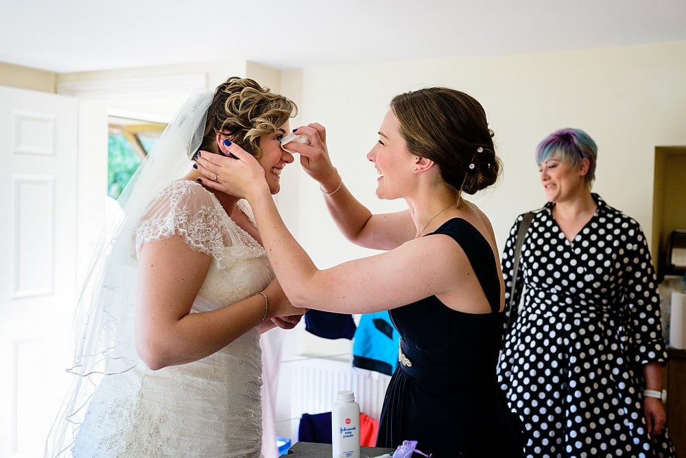 Bride having her make up done for a Pendennis Castle wedding