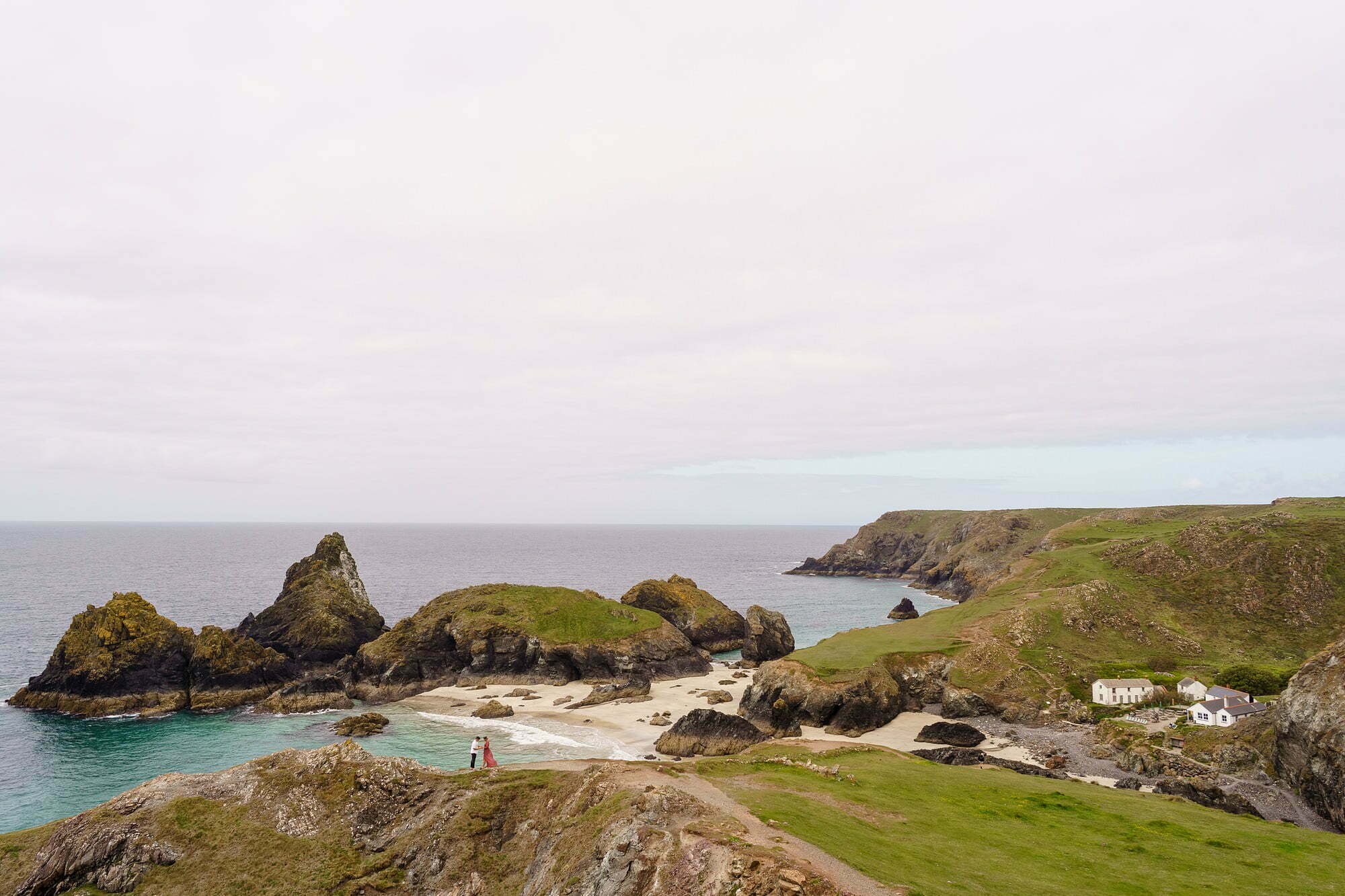 wedding photography with the view of the Kynance Cove cafe in the background