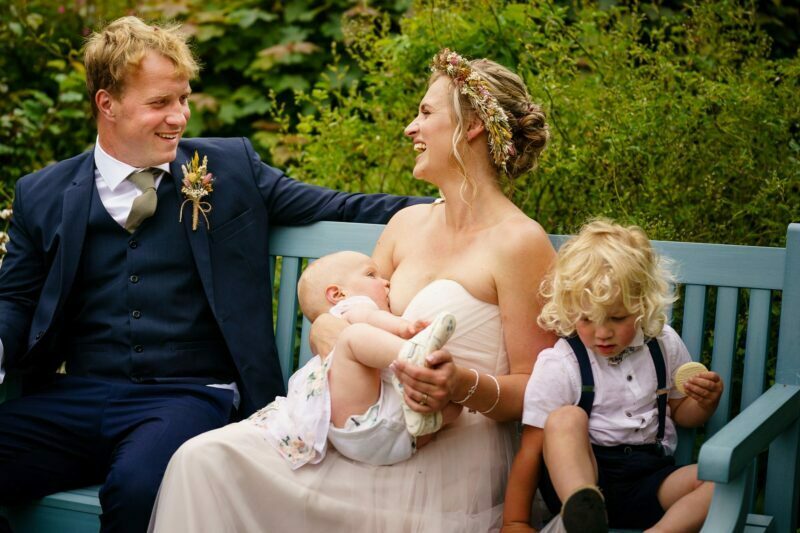 Cornish Camels Wedding Photographer 27 breast feeding in a wedding dress
