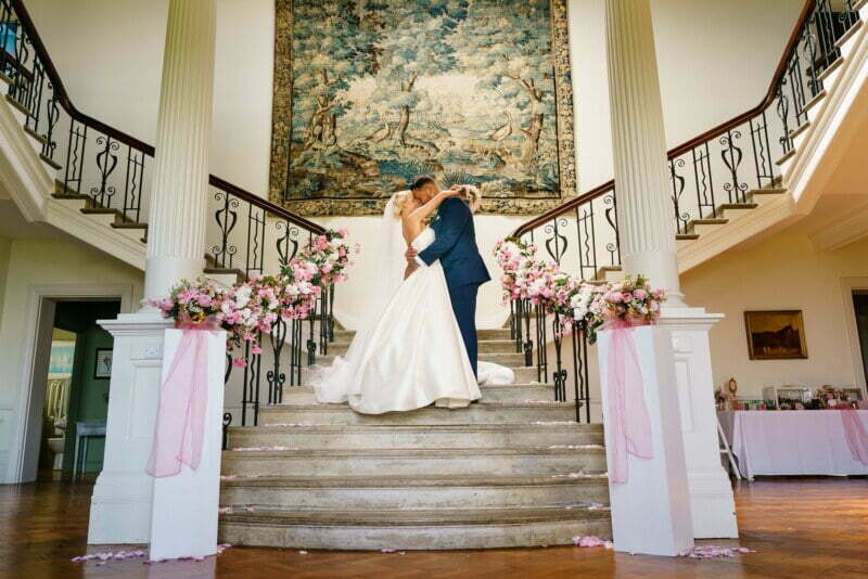 wedding photography on the grand staircase at scorrier house