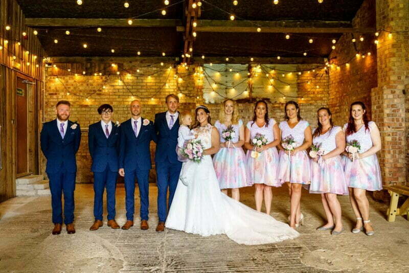 Group photos in the really rustic barn at the Green 